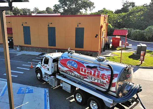 Quality Septic commercial fleet at a job site