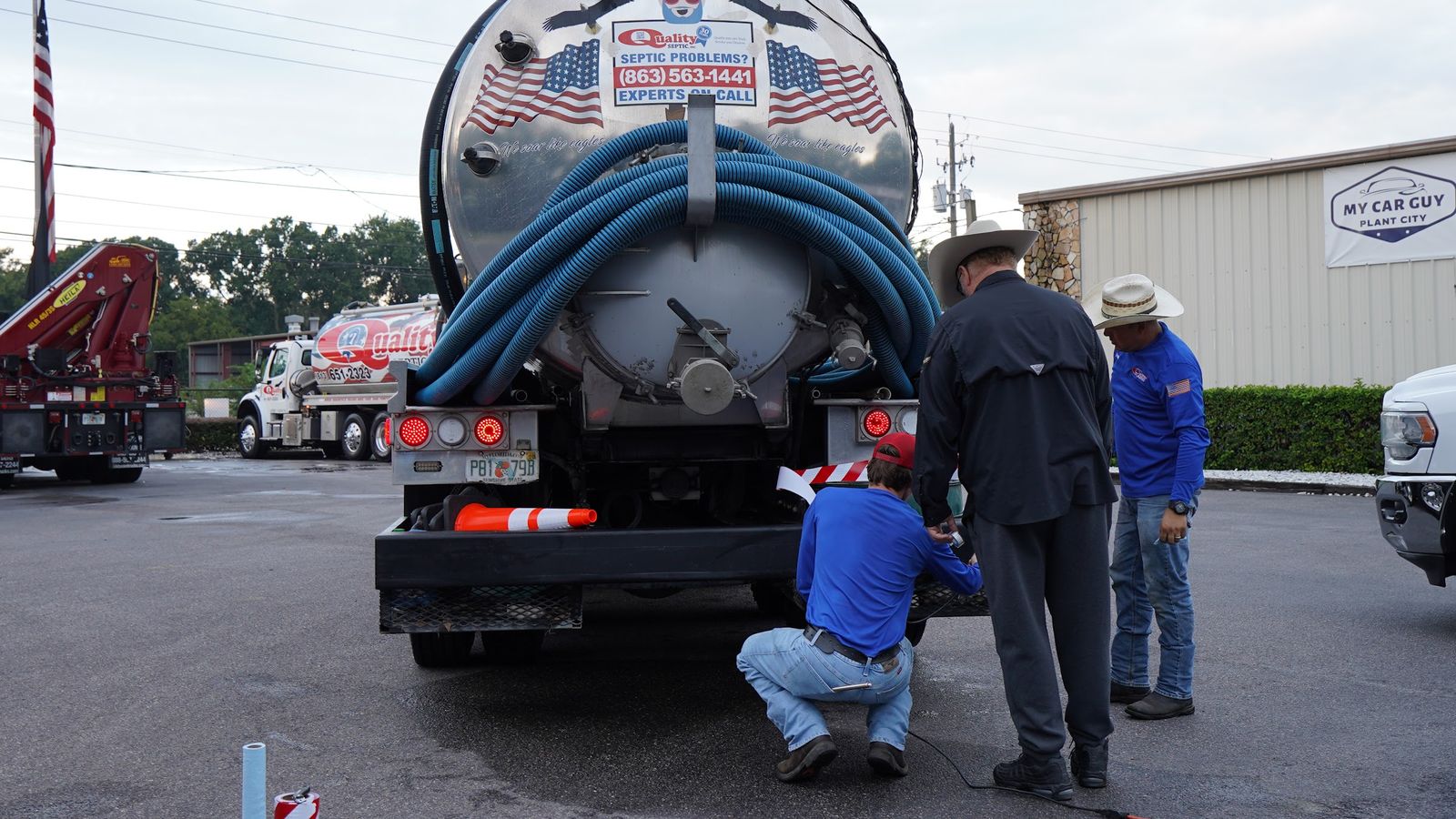Working the rear valve and hose bank before a job