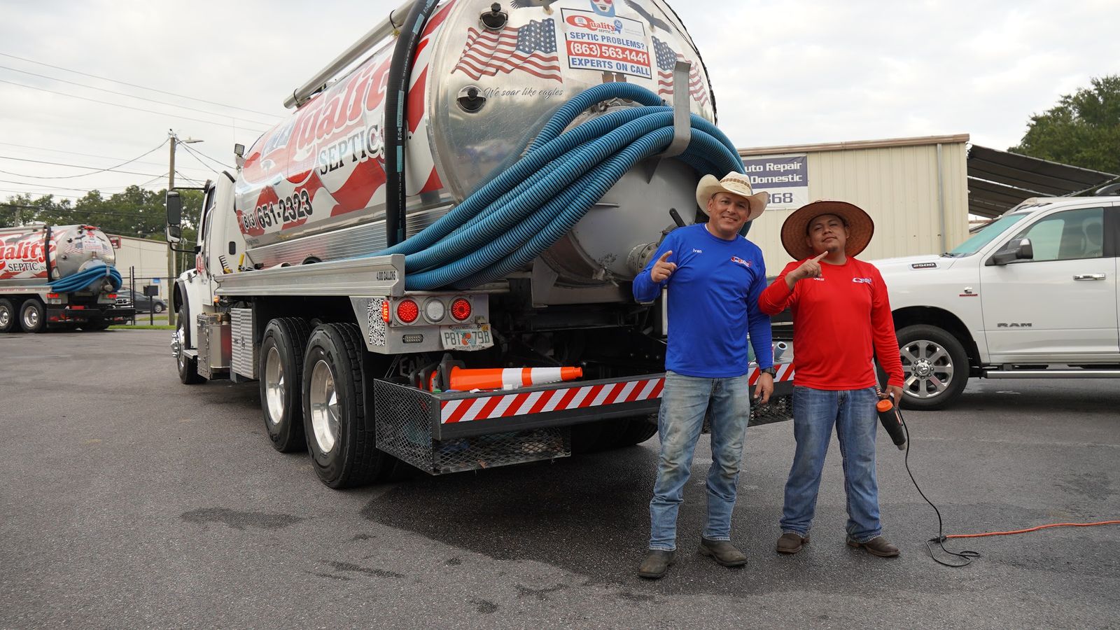 Two of the team with their truck at the Plant City yard