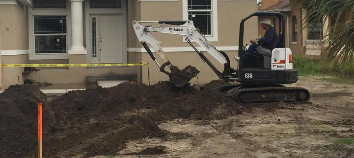 A man using backhoe